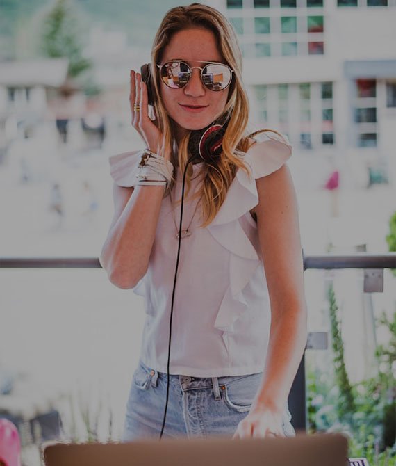 A female DJ performing a set