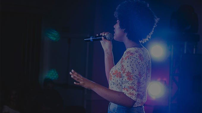 A woman singing karaoke