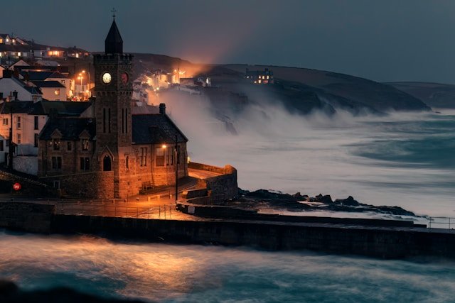 Waves crashing at night in Cornwall